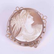 A 9ct yellow gold cameo brooch with safety chain, measuring approx. 5cm x 5cm, weight 13.05g.