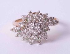 A 9ct yellow gold and diamond cluster ring, size O.