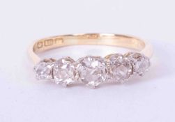 An antique 18ct yellow gold five stone ring set approx. 0.90 carats of old cut diamonds, colour