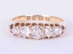 An antique 18ct yellow gold five stone ring set old cut diamonds, total approx weight 0.98 carats,