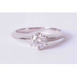 A platinum six claw solitaire ring set approx. 0.75 carat round brilliant cut diamond, colour H,