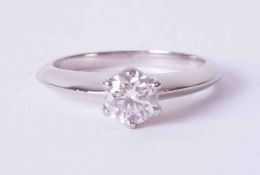 A platinum six claw solitaire ring set approx. 0.75 carat round brilliant cut diamond, colour H,