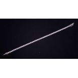 A fine 18ct white gold line bracelet set fifty round brilliant cut diamonds, approximately 6.00