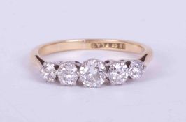 An 18ct yellow gold & platinum five stone ring set approx. 0.57 carats total weight of old cut