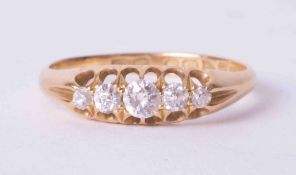An antique 18ct yellow gold five stone ring set with approx. 0.35 carats of old round cut