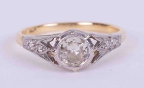 An antique 18ct yellow gold and platinum ring set with a rub over old cut round diamond, approx. 0.