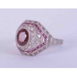 A platinum Art Deco style ring set central oval cut ruby, 1.17 carats, colour vivid red "Pigeon