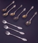 A set of six sterling silver Tiffany & Co teaspoons with scallop design, gilded bowls each