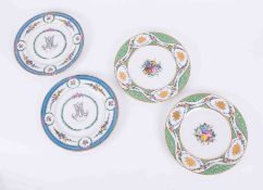 Two pairs of Sevres porcelain flower & gilt plates, each with blue Sevres underglaze mark,