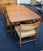 A McIntosh retro teak dining table (160cm x 90cm closed) double leaf extension with six dining