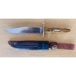 A Victorian era Joseph Rogers Bowie, it has a 14.7cm clip point blade, a full tang handle with