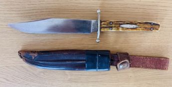 A Victorian era Joseph Rogers Bowie, it has a 14.7cm clip point blade, a full tang handle with