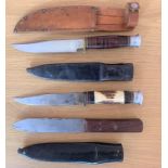 Three various knives with 12.6cm long blades.