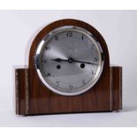 Enfield, a walnut cased eight day mantel clock with gong strike.