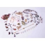 Large collection of costume jewellery including brooches, necklaces, silver rings, earrings,