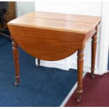 A Victorian mahogany drop leaf table, a mahogany bedside table, a small round wine table and a