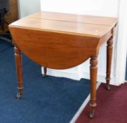 A Victorian mahogany drop leaf table, a mahogany bedside table, a small round wine table and a