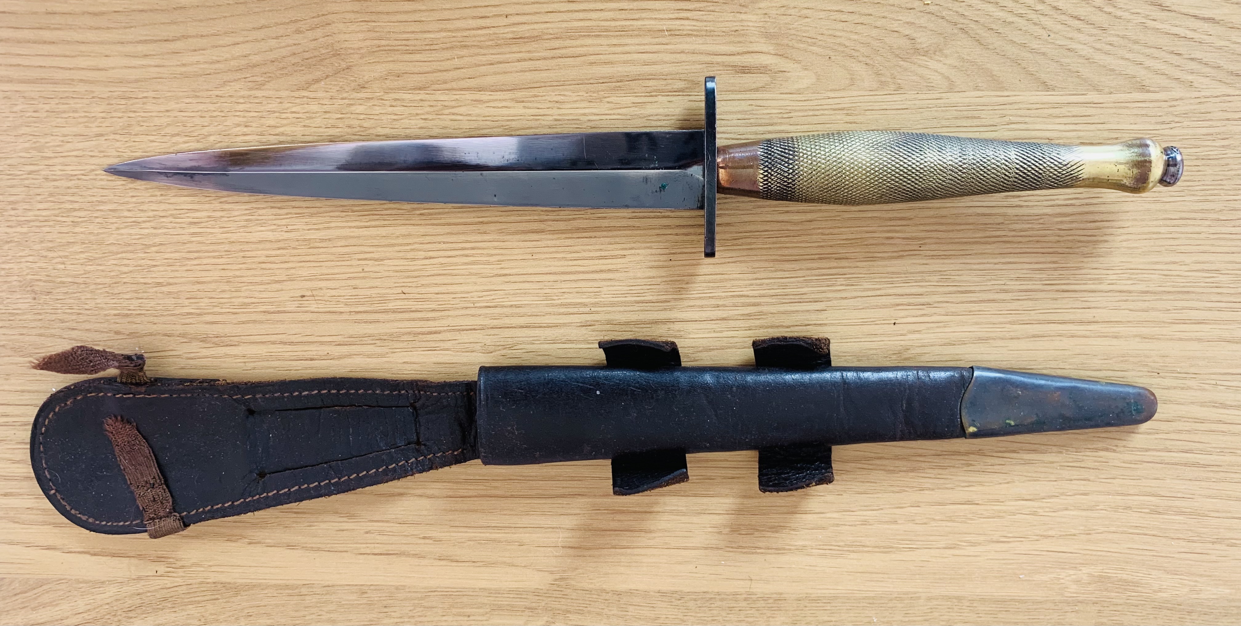 A WW2 Pattern Two Fairbairn Sykes Commando Knife, the blade is blued and the guard has the marking - Image 2 of 3