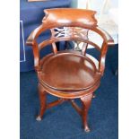 A heavy early 20th Century mahogany captains swivel chair.