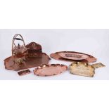 A collection of mixed copperwares including an Art Nouveau style letter holder, kettle, dishes, Arts