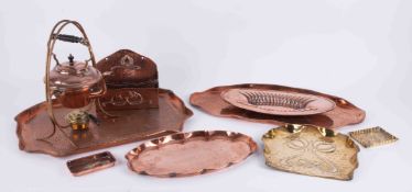 A collection of mixed copperwares including an Art Nouveau style letter holder, kettle, dishes, Arts