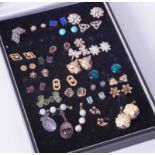 A mixed collection of dress earrings, approximately 25 pairs.