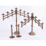 A pair 19th/early 20th century extendable brass candlesticks, 62cm wide.
