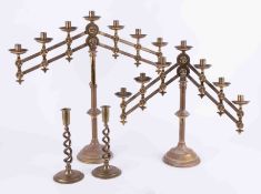 A pair 19th/early 20th century extendable brass candlesticks, 62cm wide.