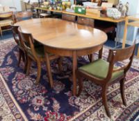 A Georgian mahogany D-end dining table with two extension leaves, length approx. 200cm x 100cm