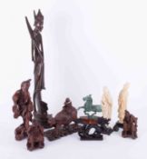 A collection of 20th century Oriental carved hardwood figures, replica of the antique racing horse