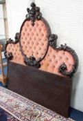 A large carved mahogany headboard, width 170cm.