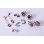 A bag of six pairs of silver earrings including silver & amethyst drop earrings, ornate silver