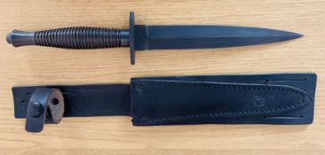 A Modern Commando knife with a 16.4 cm long blade, never used