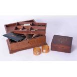 Two wooden sewing boxes one with a carved coat of arms also a pair of napkin rings with silver