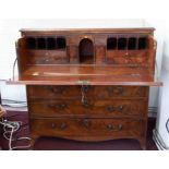 A Georgian mahogany secretaire chest, the upper drawer with a fitted interior over four long