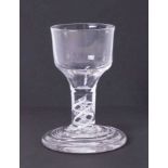 A 19th Century short drinking glass with air twist stem, height 10cm.