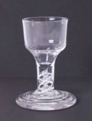 A 19th Century short drinking glass with air twist stem, height 10cm.