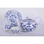 A Meissen Onion pattern blue and white porcelain service, approx fifty pieces, including cups and