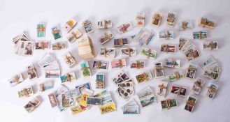 A collection of cigarette card including Butterflies, Transport, Cycling together with Kensitas