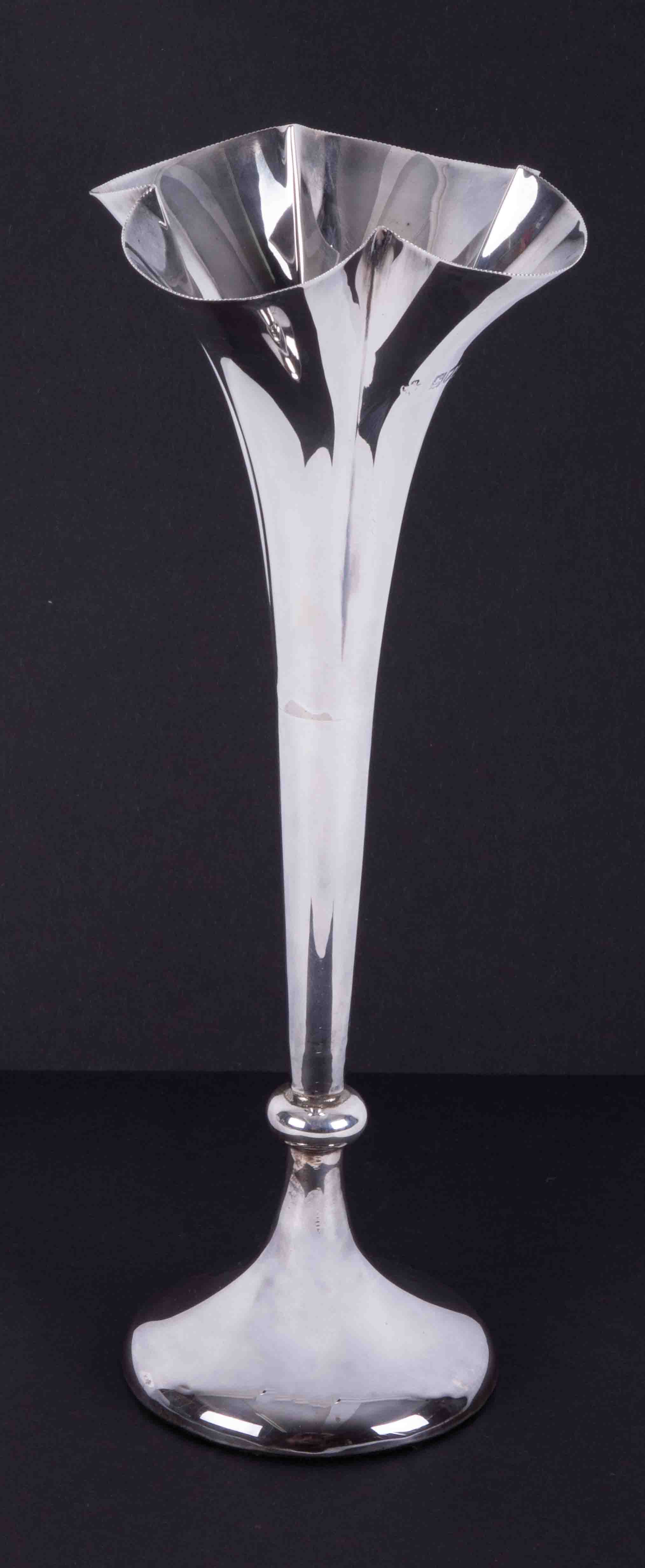 A silver spill vase, with London assay mark, approx 27cm.
