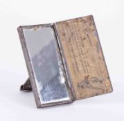 A WWI `Vigilant` periscope mirror, of folding form, copyright 1914 (with paper label for fixing onto