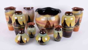 A collection of Watcombe & other Westcountry pottery vases and jardiniere with sailing ship