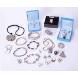 A collection of "silver" modern jewellery, various necklaces, brooches, pendants, earrings, etc,