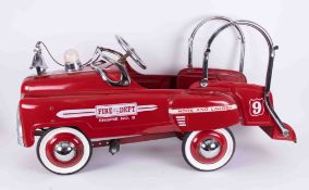 A tin plate child's pedal car, Fire Engine circa 1950/1960's, original red paint, chrome good, and