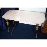 A marble top coffee table with brass mounted and wood turned legs of antique style, 100cm x 49cm.