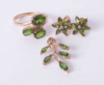 A 9ct and green stone dress ring together with matching earrings and pendant, approx. 6g.