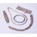 A bag of mixed silver jewellery items including a gate bracelet with heart padlock & a flat link