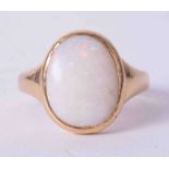 An 18ct and opal set ring, approx. 6.6oz.