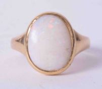 An 18ct and opal set ring, approx. 6.6oz.