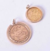 A Queen Victoria half sovereign 1897 mounted together with George V full sovereign 1915 in a